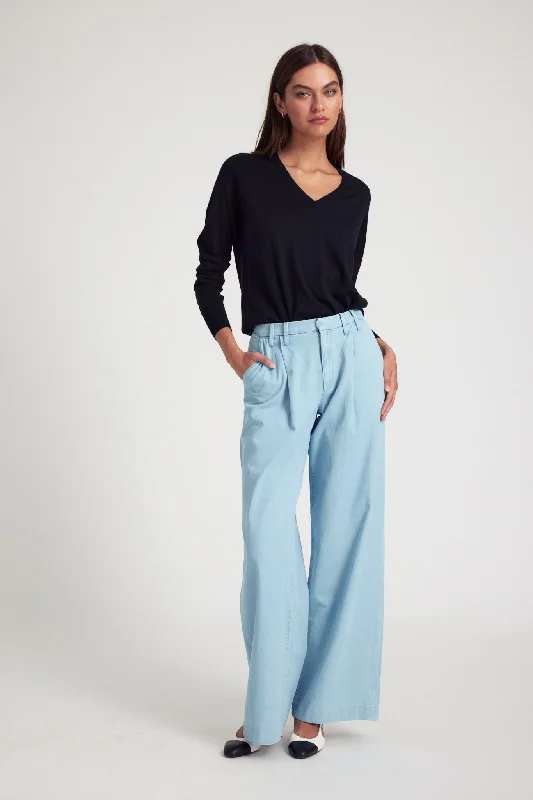 Multi-pocket pants for organized travel convenience -Light Blue Chambray Pleated Trousers