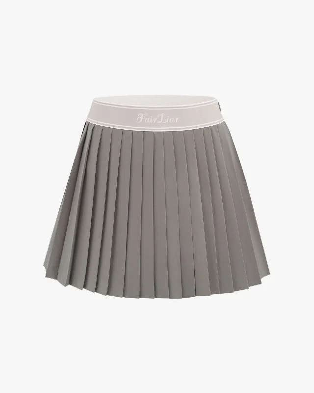 Patterned skirts with geometric print edge -Logo Jacqard Band Pleated Skirt - Cocoa